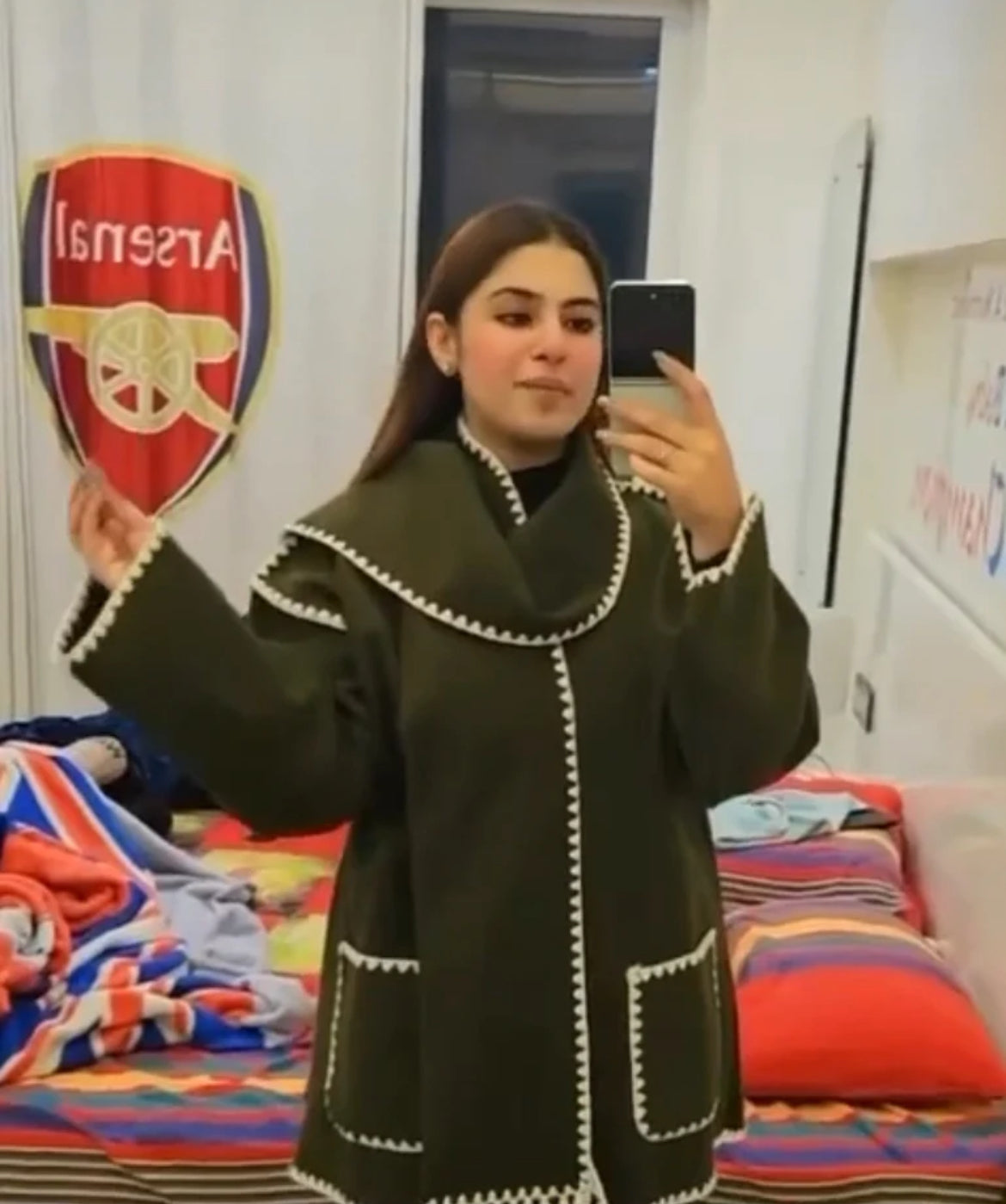 Coat with muffler